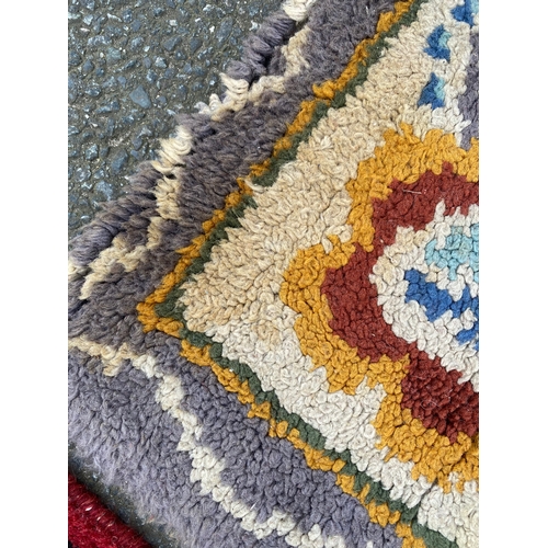 608 - Four small Rugs / Carpets.