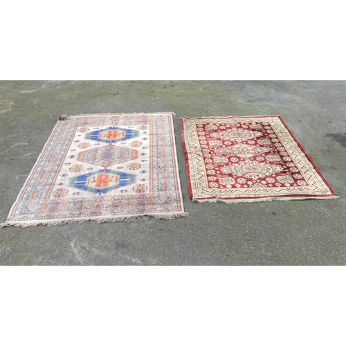 609 - Two Persian carpets / rugs