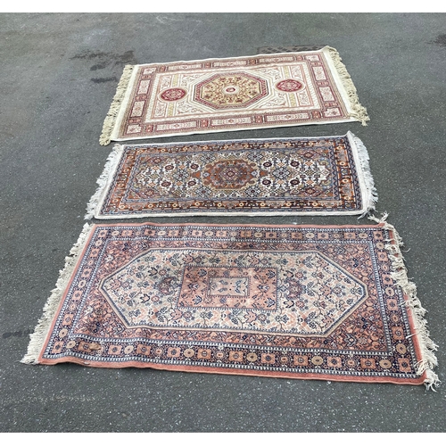 610 - Three small Rugs / Carpets.