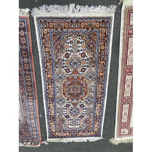 610 - Three small Rugs / Carpets.