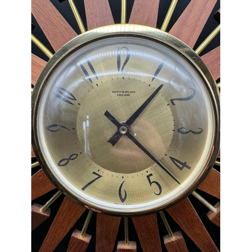 32 - Mid Century Teak & Brass Anstey & Wilson Star Burst Clock - 64cm