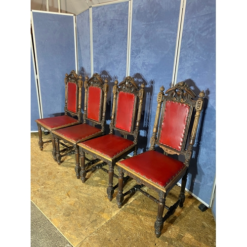 300 - Four red leather antique chairs.