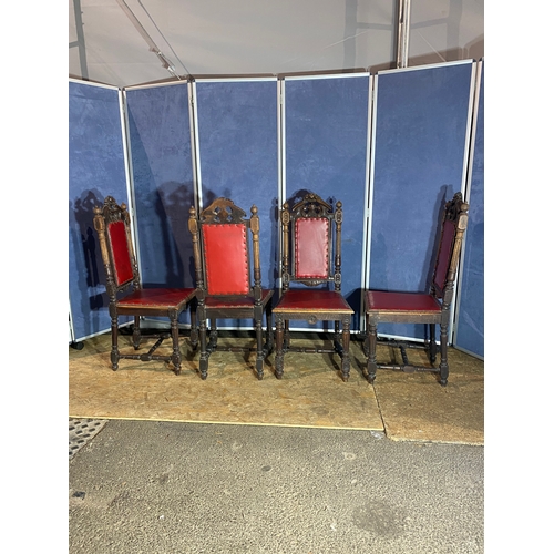 300 - Four red leather antique chairs.