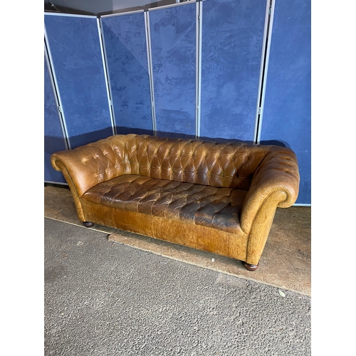 322 - Large tan leather button back chesterfield sofa. 

Dimensions - 78.5