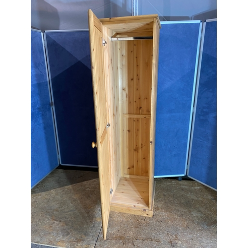 324 - Pine narrow wardrobe. 

Dimensions - 18.5