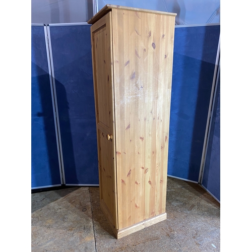 324 - Pine narrow wardrobe. 

Dimensions - 18.5