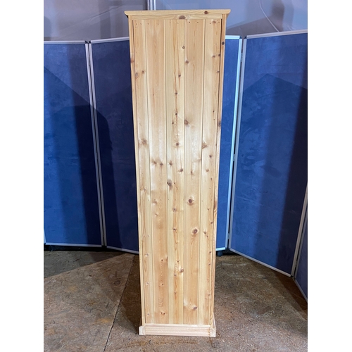 324 - Pine narrow wardrobe. 

Dimensions - 18.5