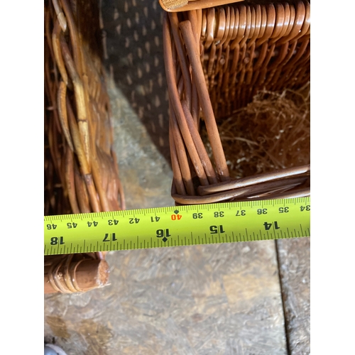 333 - A trio of wooden/wickers baskets. 

Dimensions of largest in images for reference.