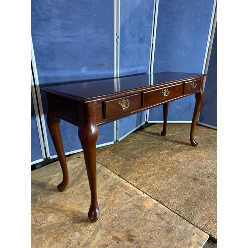 336 - Mahogany low console table. 

Dimensions - 48