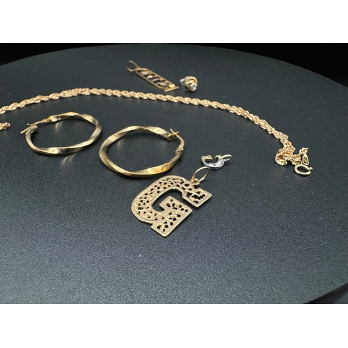 72 - Collection of 9ct yellow gold jewellery including hoop earrings, G Pendants, Egyptian Pendant + neck... 