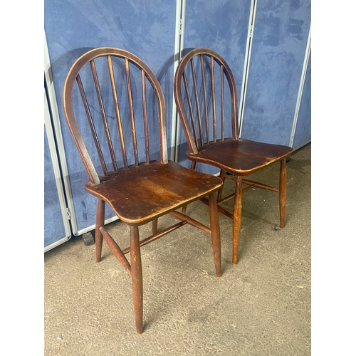 345 - A pair of Mid century Ercol chairs. 

Dimensions - 16