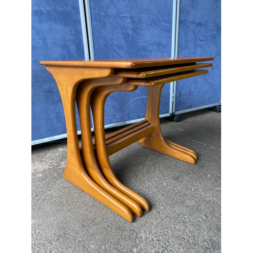 362 - A nest of three mid century teak tables. 

Dimensions of largest - 22