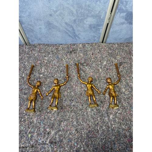 Vintage brass Cherub figure furniture mounts Set of four.