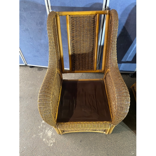 396 - Two good quality wicker conservatory arm chairs.