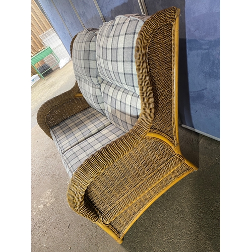 397 - A good quality two seater wicker conservatory sofa and stool. 

Please see images for all dimensions... 