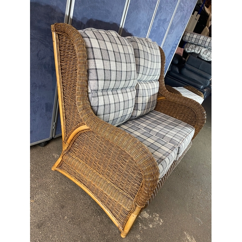 397 - A good quality two seater wicker conservatory sofa and stool. 

Please see images for all dimensions... 