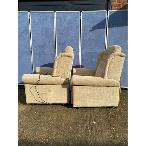 401 - A pair of upholstered HSL electric rising armchairs. 

Dimensions - 30