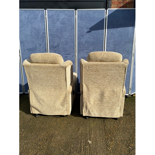 401 - A pair of upholstered HSL electric rising armchairs. 

Dimensions - 30