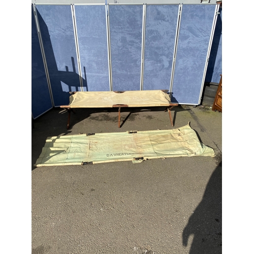 413 - A WW2 period Military canvas bed / stretcher - D A Wheatley

Please see images for dimensions.