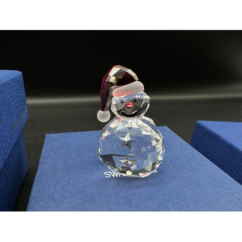 91 - Four Swarovski Crystal Christmas Theme in boxes / COA  including 2 x snowmen 1005414, reindeer 50004... 