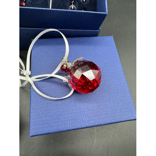 92 - Quantity of Swarovski Crystal Christmas decoration / baubles in boxes / COA - 860748 / 604190 / 1054... 