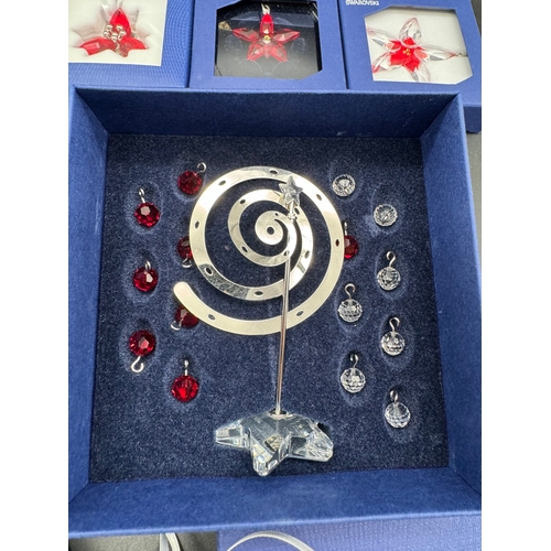 92 - Quantity of Swarovski Crystal Christmas decoration / baubles in boxes / COA - 860748 / 604190 / 1054... 