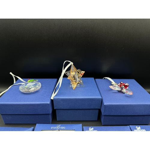 92 - Quantity of Swarovski Crystal Christmas decoration / baubles in boxes / COA - 860748 / 604190 / 1054... 