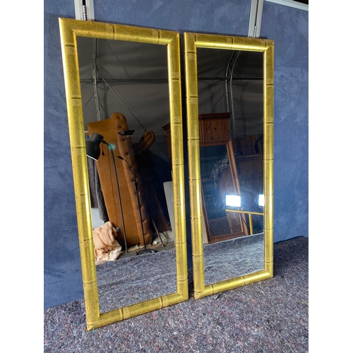 223 - A pair of Modern gilt framed mirrors.