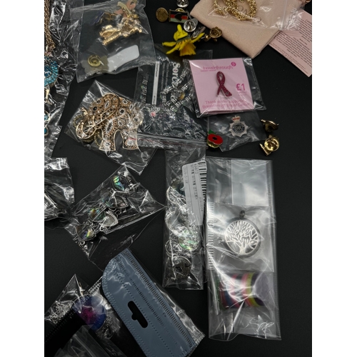 99 - Quantity of mostly new costume jewellery, brooches, necklaces, bangles etc