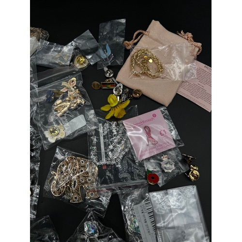 99 - Quantity of mostly new costume jewellery, brooches, necklaces, bangles etc