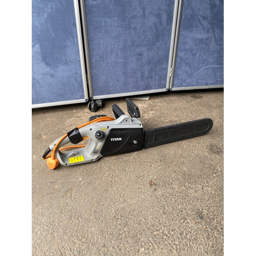 438 - Titan electric chain saw.