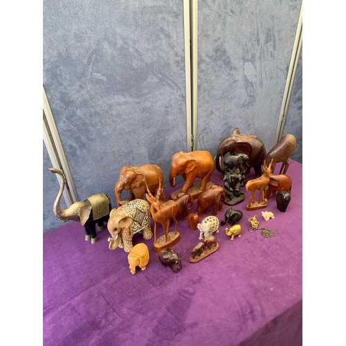 444 - Quantity of carved Wooden Elephants + others