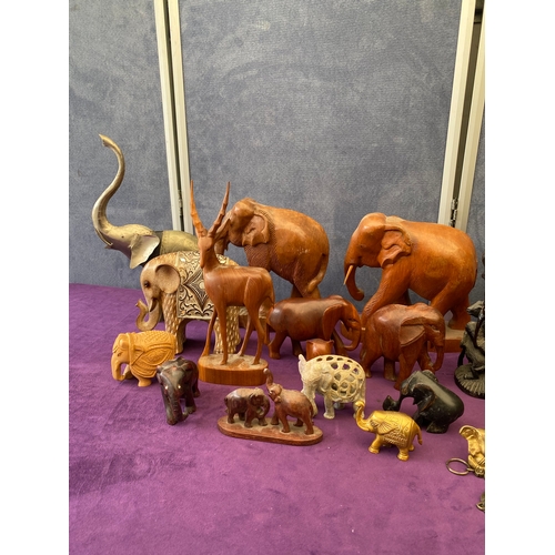 444 - Quantity of carved Wooden Elephants + others