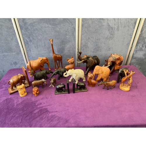 449 - Quantity of carved wooden Elephants and animal ornaments.