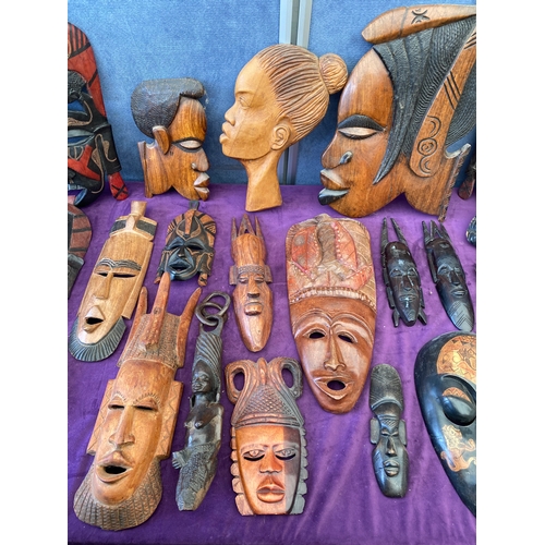 453 - A collection of African tribal masks / wall art