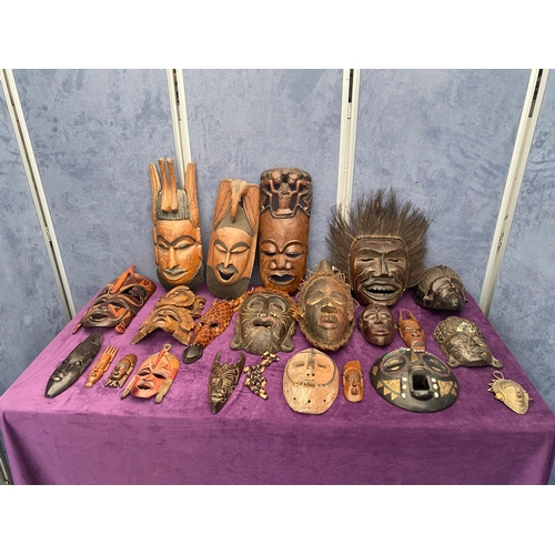 463 - A collection of wooden African tribal / ritual masks.