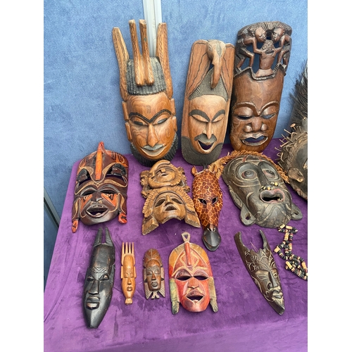 463 - A collection of wooden African tribal / ritual masks.