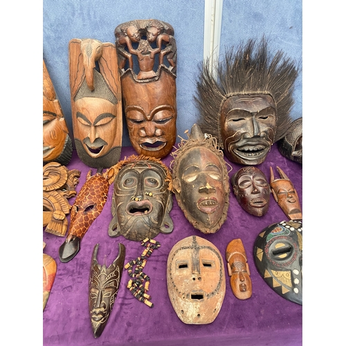 463 - A collection of wooden African tribal / ritual masks.