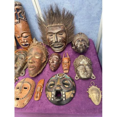 463 - A collection of wooden African tribal / ritual masks.