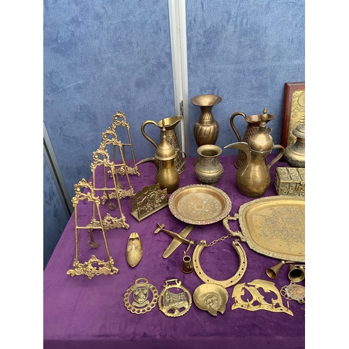 467 - A Large collection of vintage brass collectables including trays, Jugs, picture / letter holders.