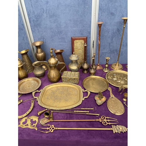 467 - A Large collection of vintage brass collectables including trays, Jugs, picture / letter holders.