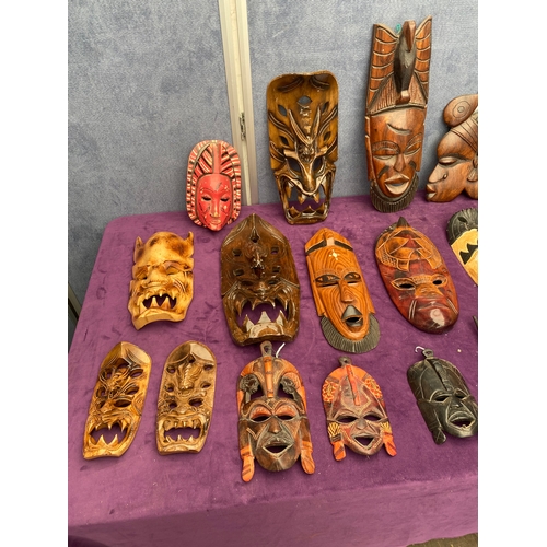 473 - A large collection of African / tribal masks.