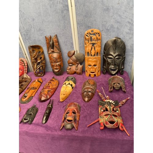 473 - A large collection of African / tribal masks.