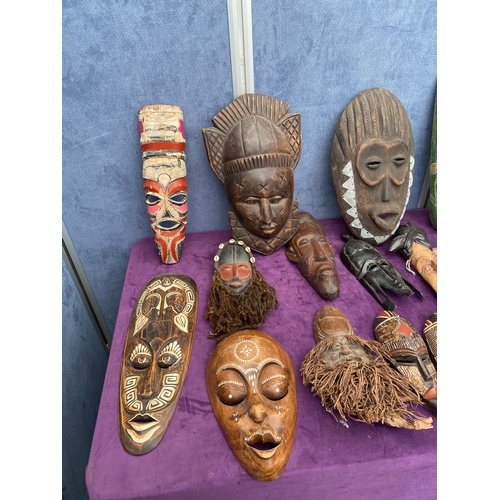 474 - A large collection of African / tribal masks.