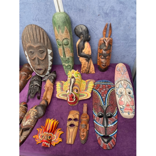 474 - A large collection of African / tribal masks.