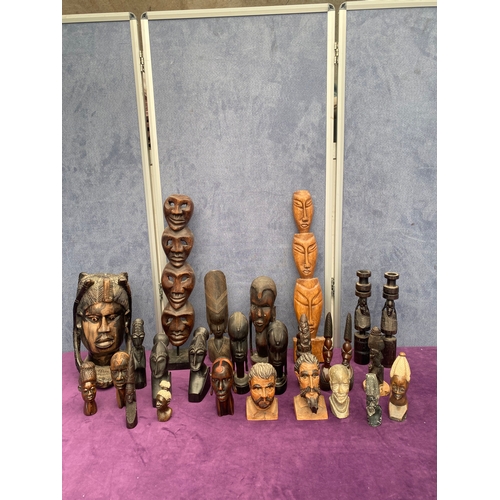 476 - A collection of African wooden / Resin busts and ornaments.