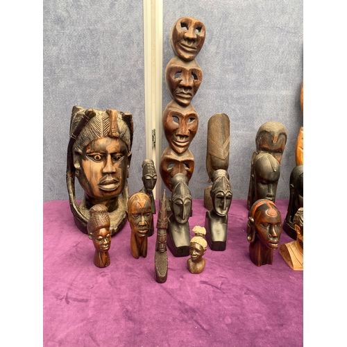 476 - A collection of African wooden / Resin busts and ornaments.