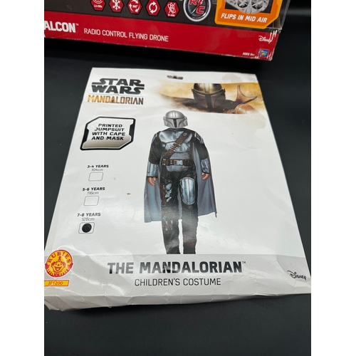 507 - Boxed Millennium Falcon RC Flying Drone, 1996 Light Saber + The Mandalorian Children's Costume