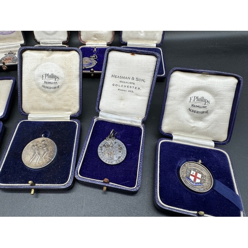 140 - 16 x Early 20th Century Medals Football, Boxing, Military, Cricket + others in original medalist cas... 