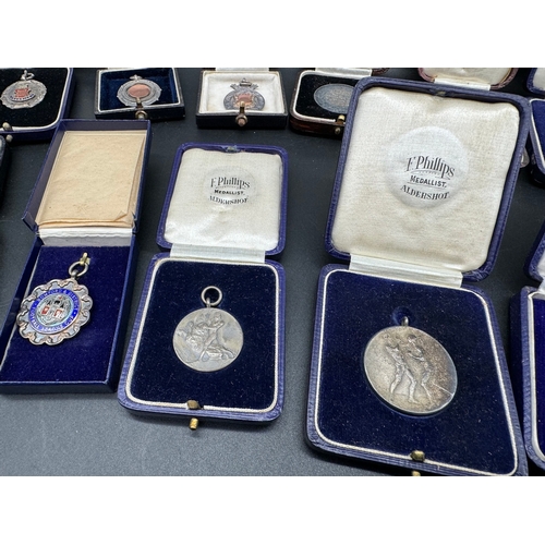 140 - 16 x Early 20th Century Medals Football, Boxing, Military, Cricket + others in original medalist cas... 